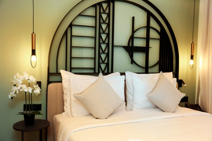 a bed with white pillows