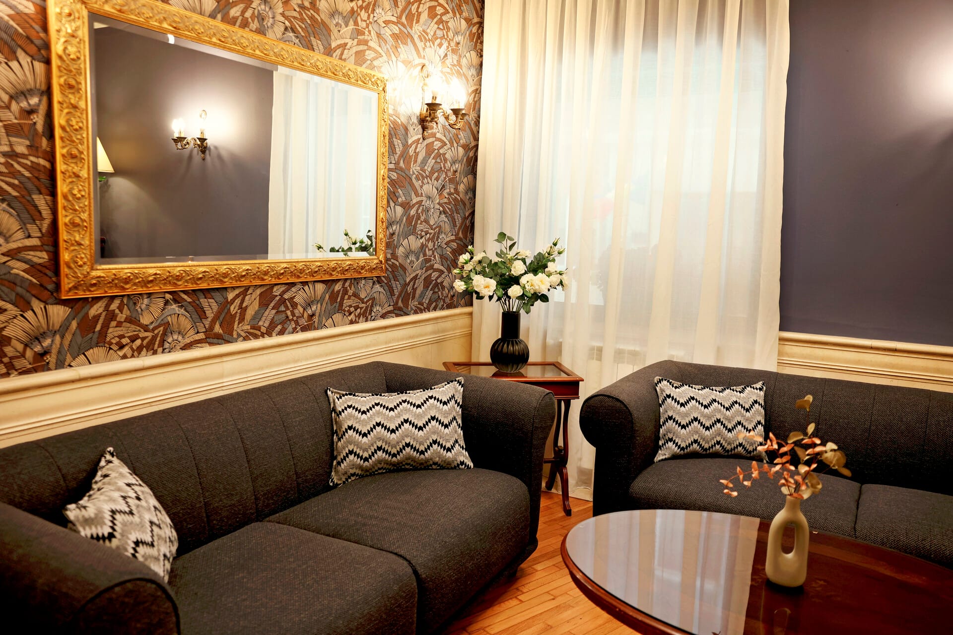 a living room with a large mirror