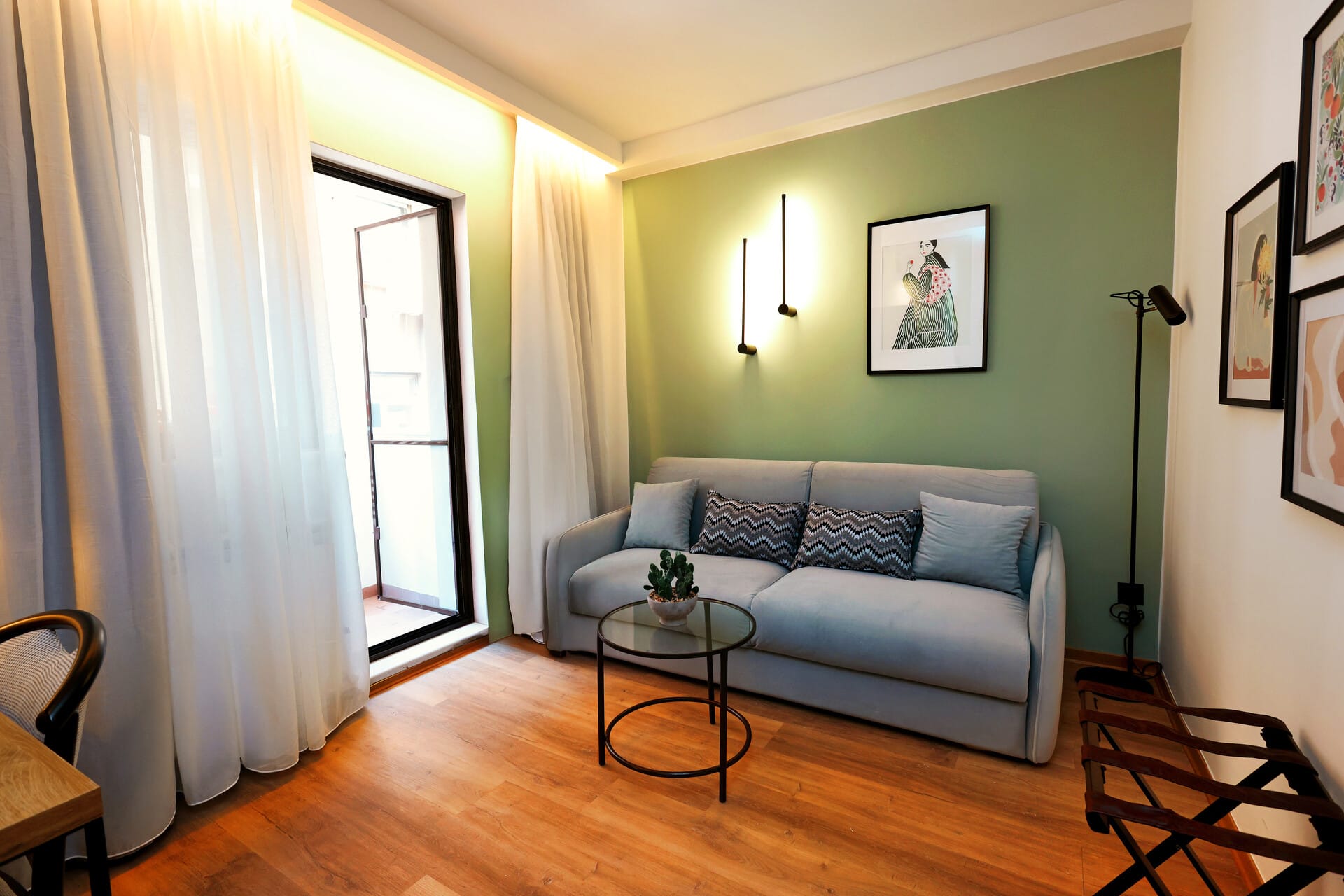 a living room with a couch and a table