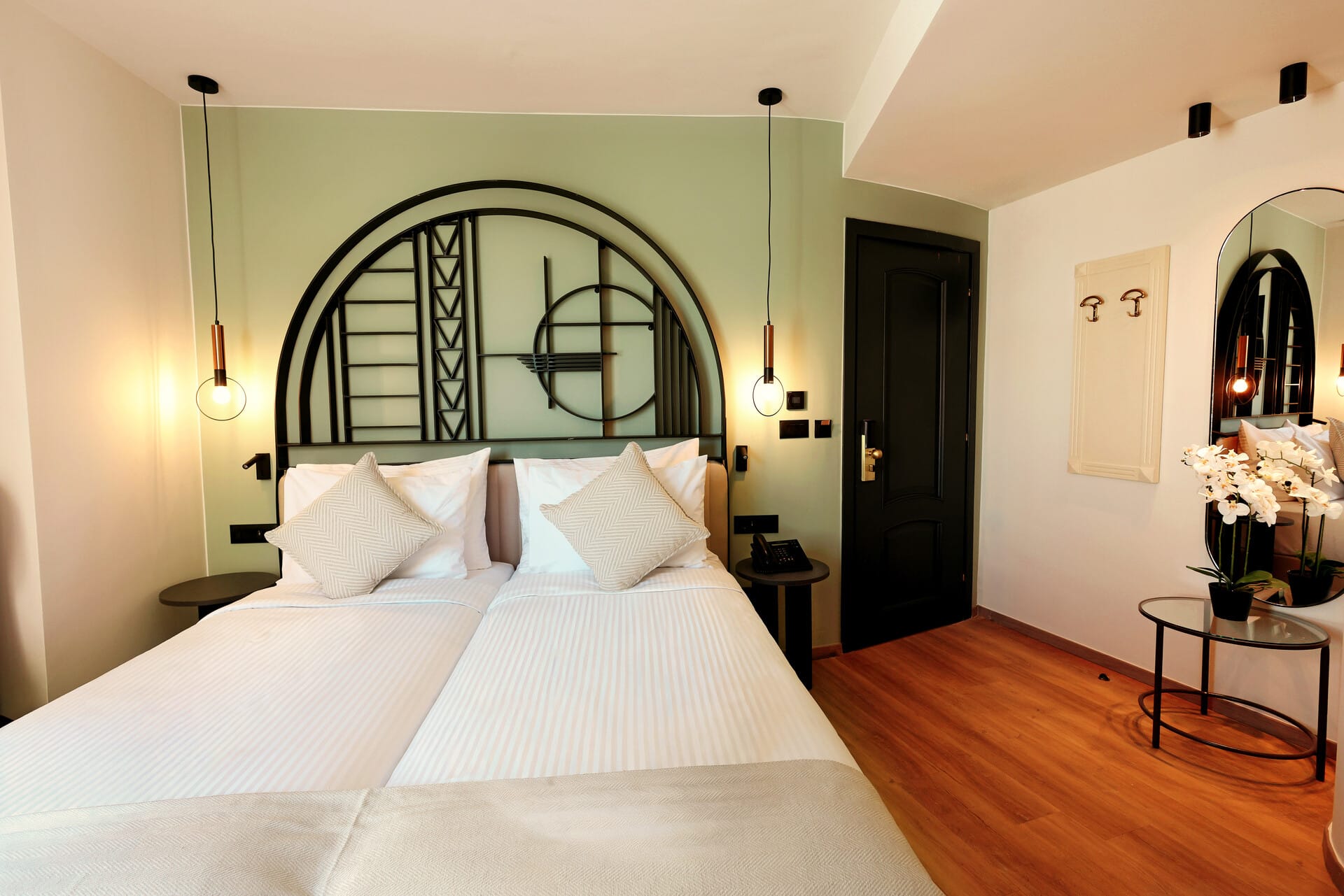 a hotel room with a large mirror