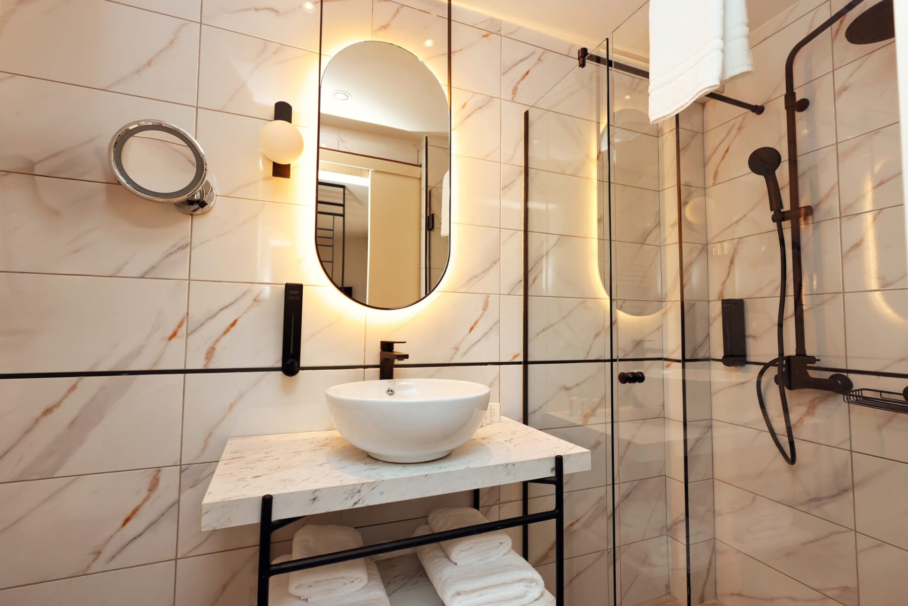 a bathroom with a glass shower