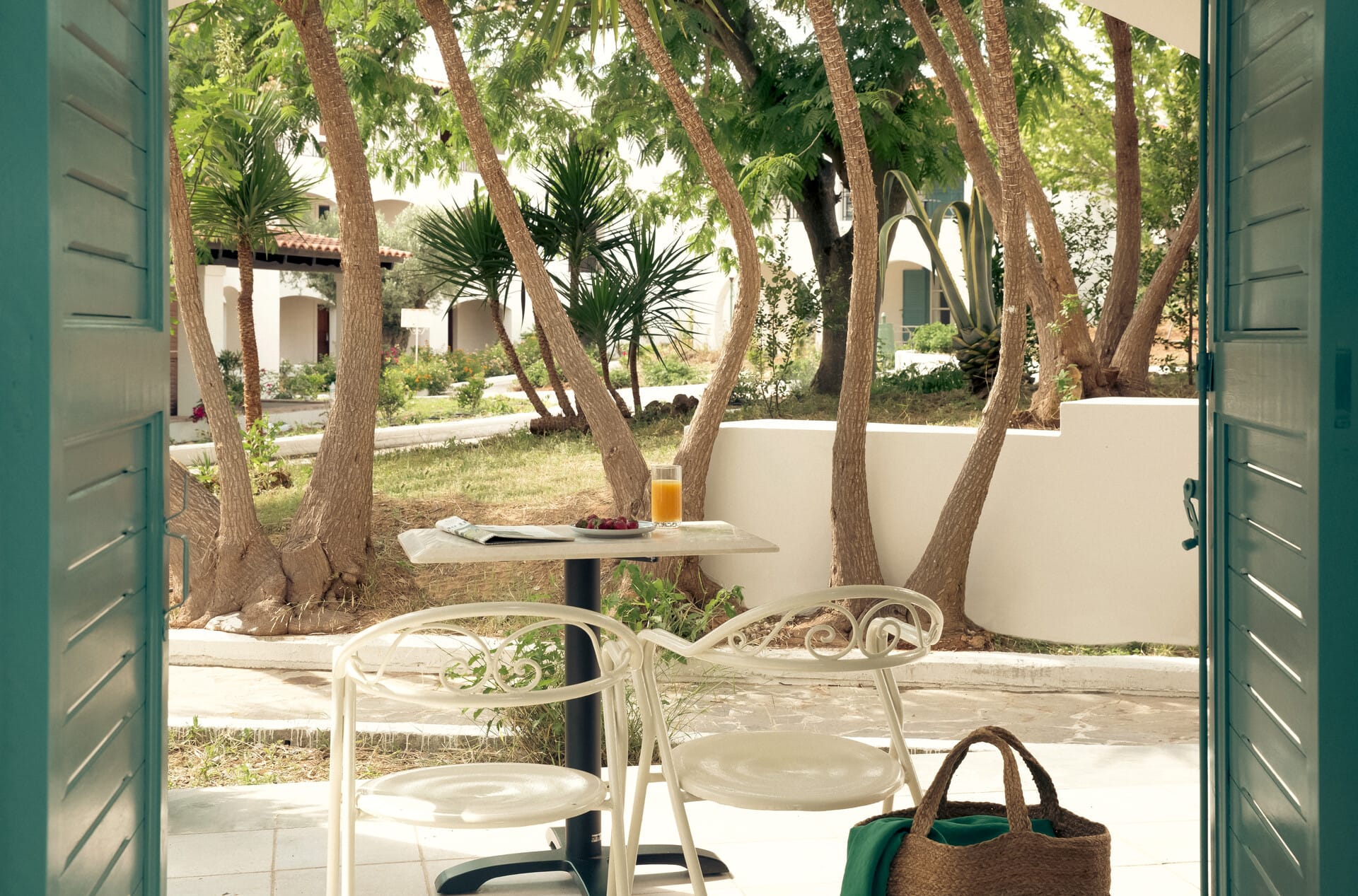 a patio with chairs and tables