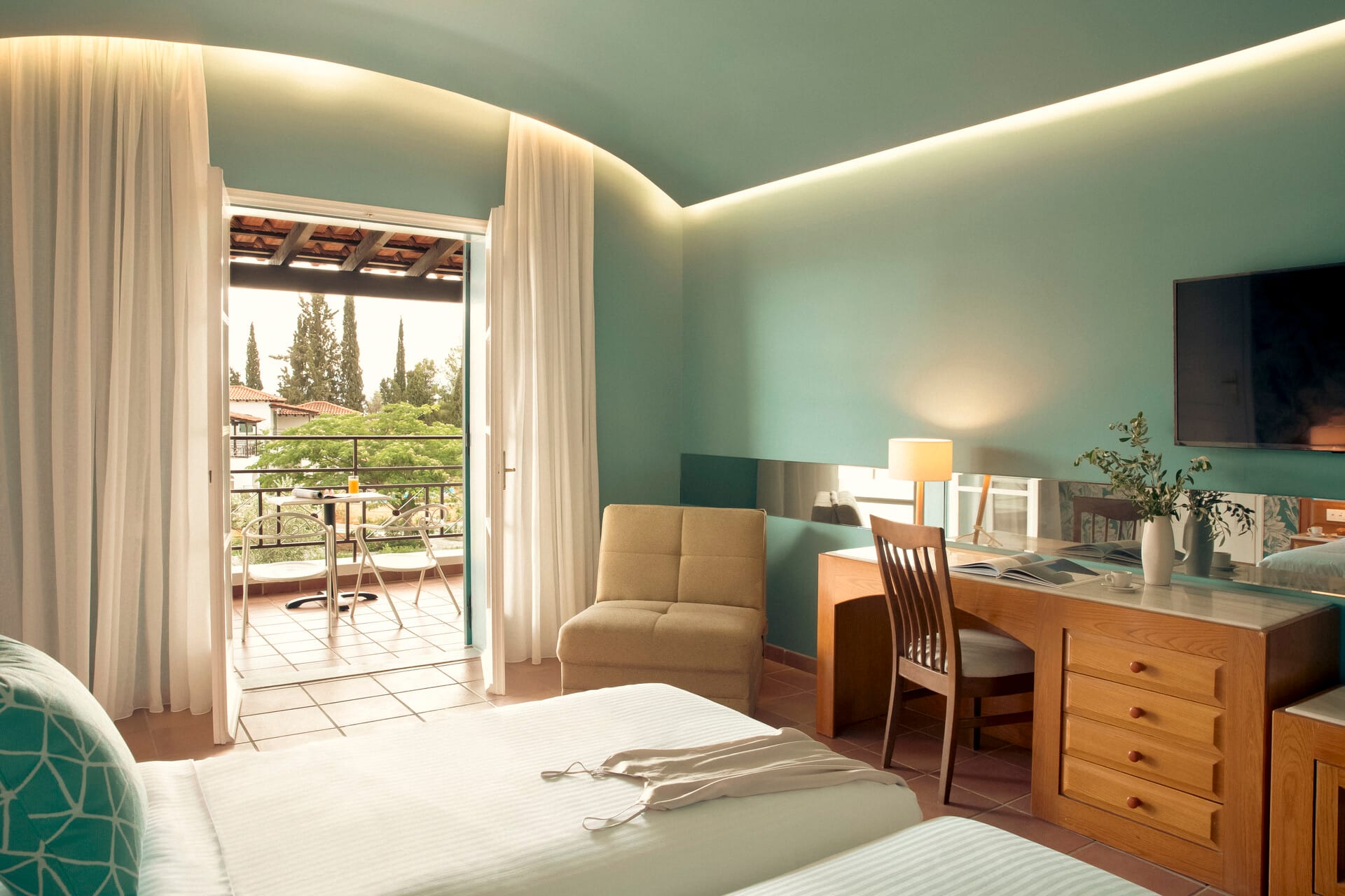 a room with a bed and a desk