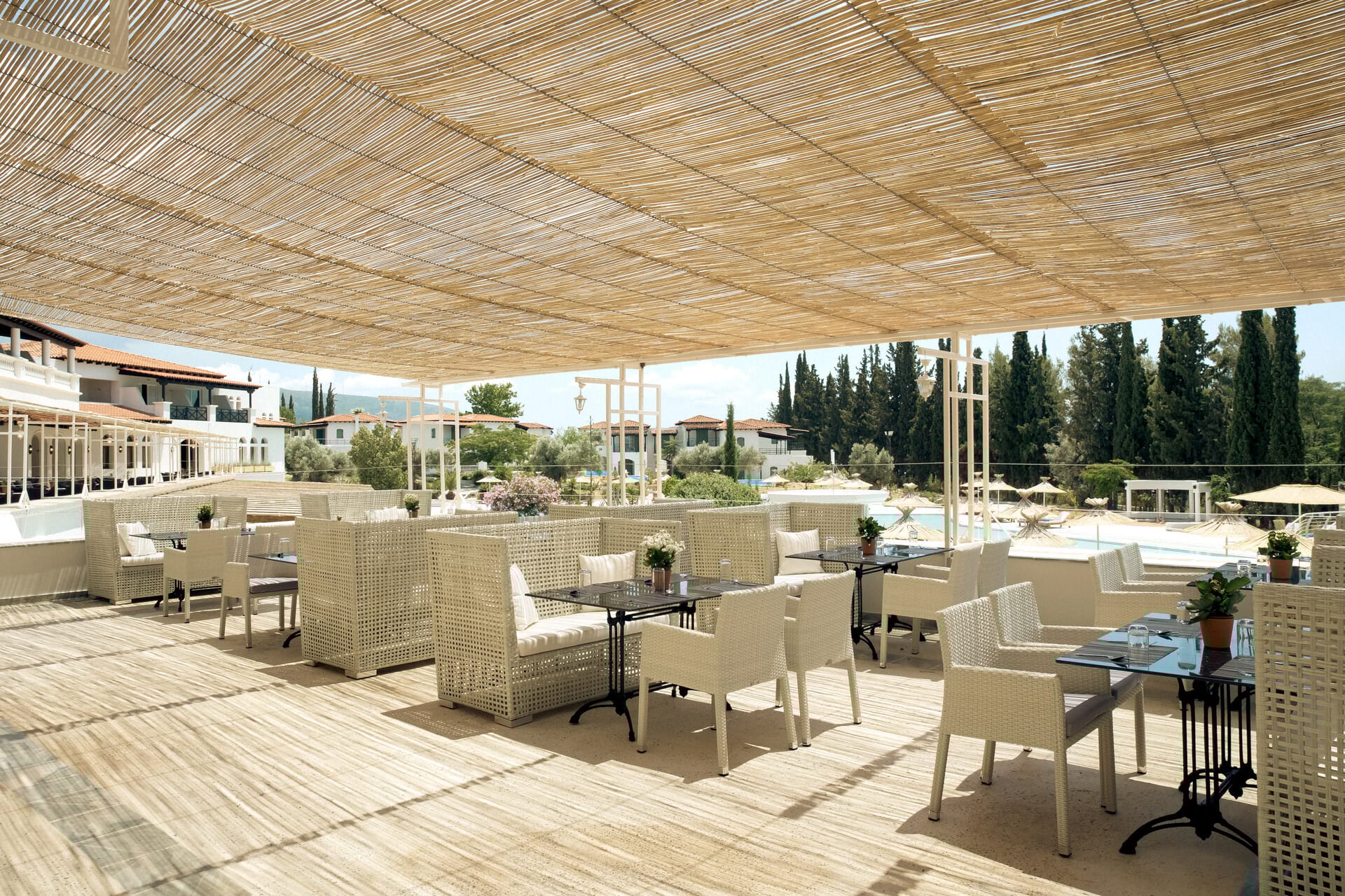 a large room with a wood floor and chairs