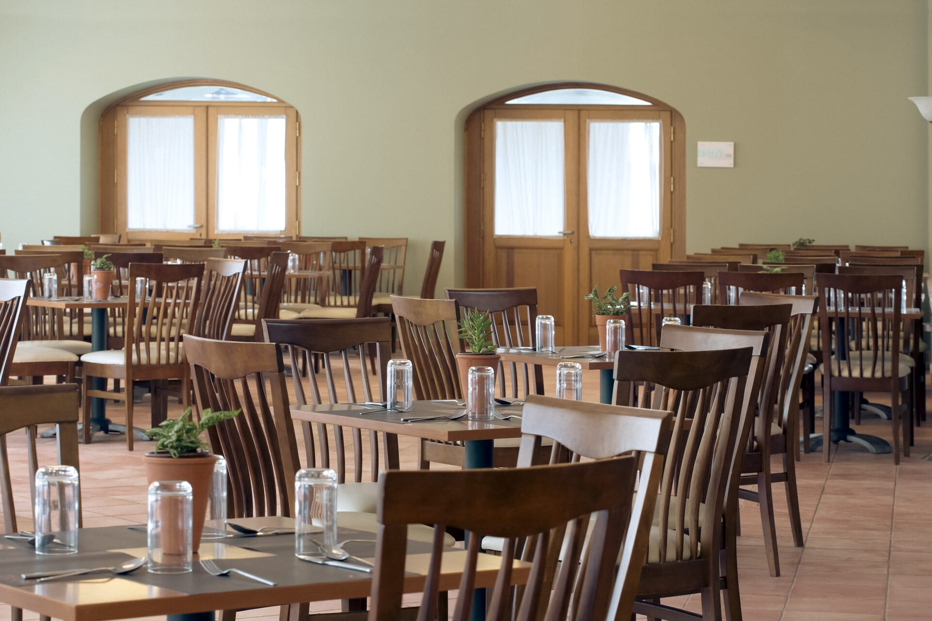 a room with tables and chairs