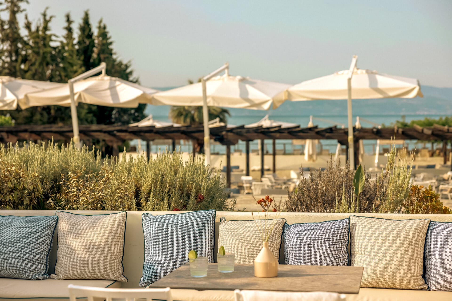 a patio with white umbrellas