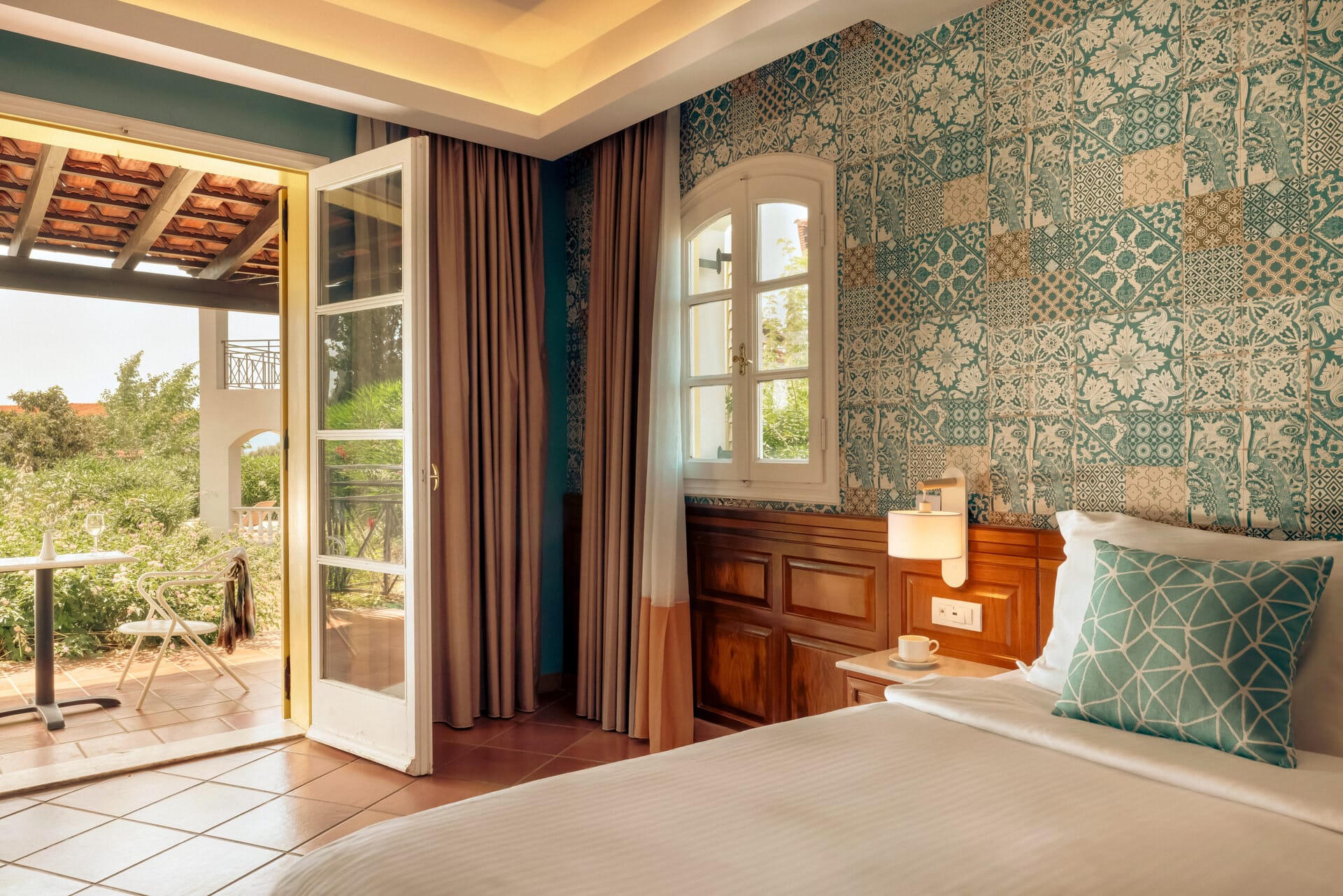 a bedroom with a large window