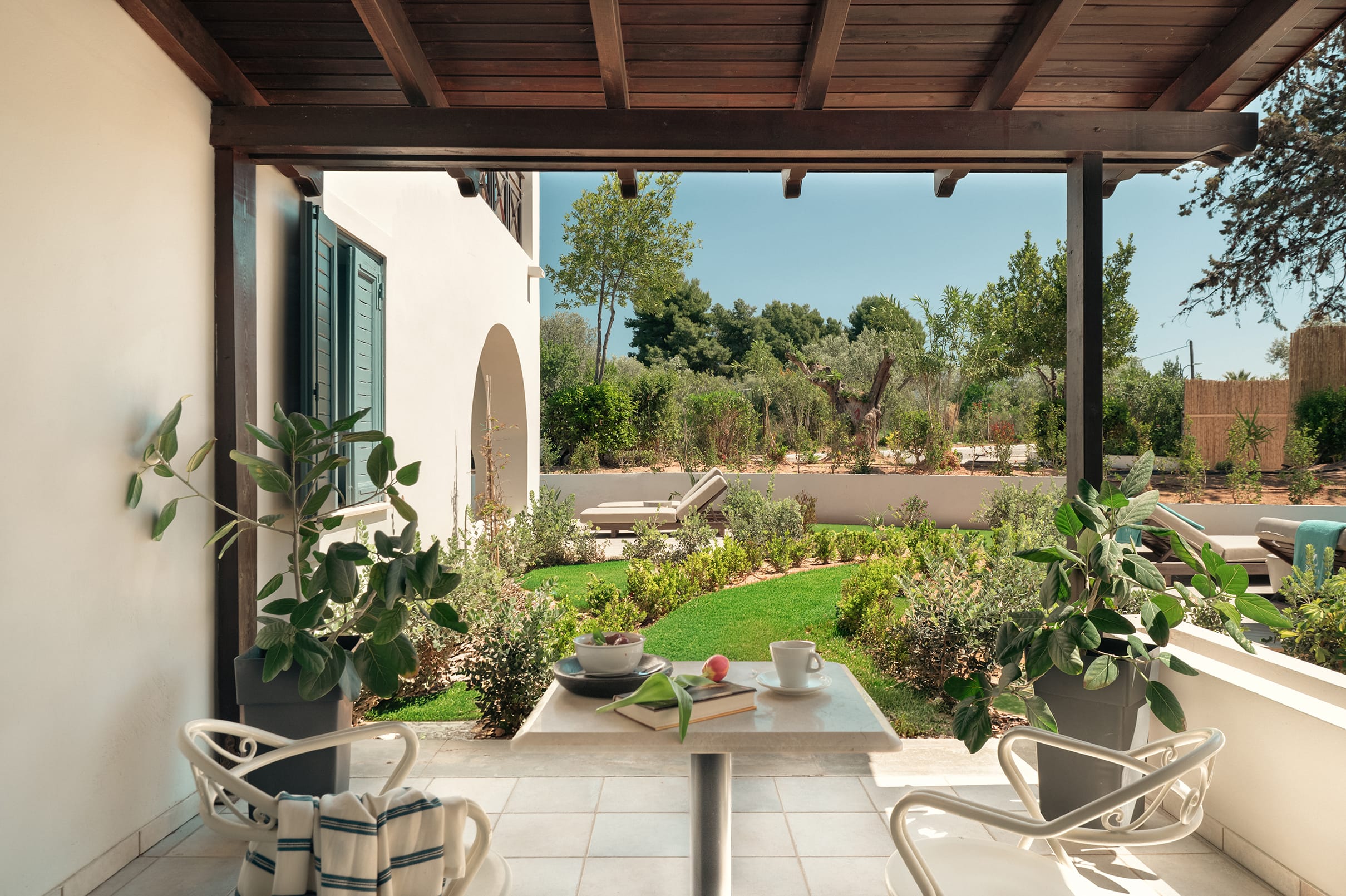 a patio with potted plants