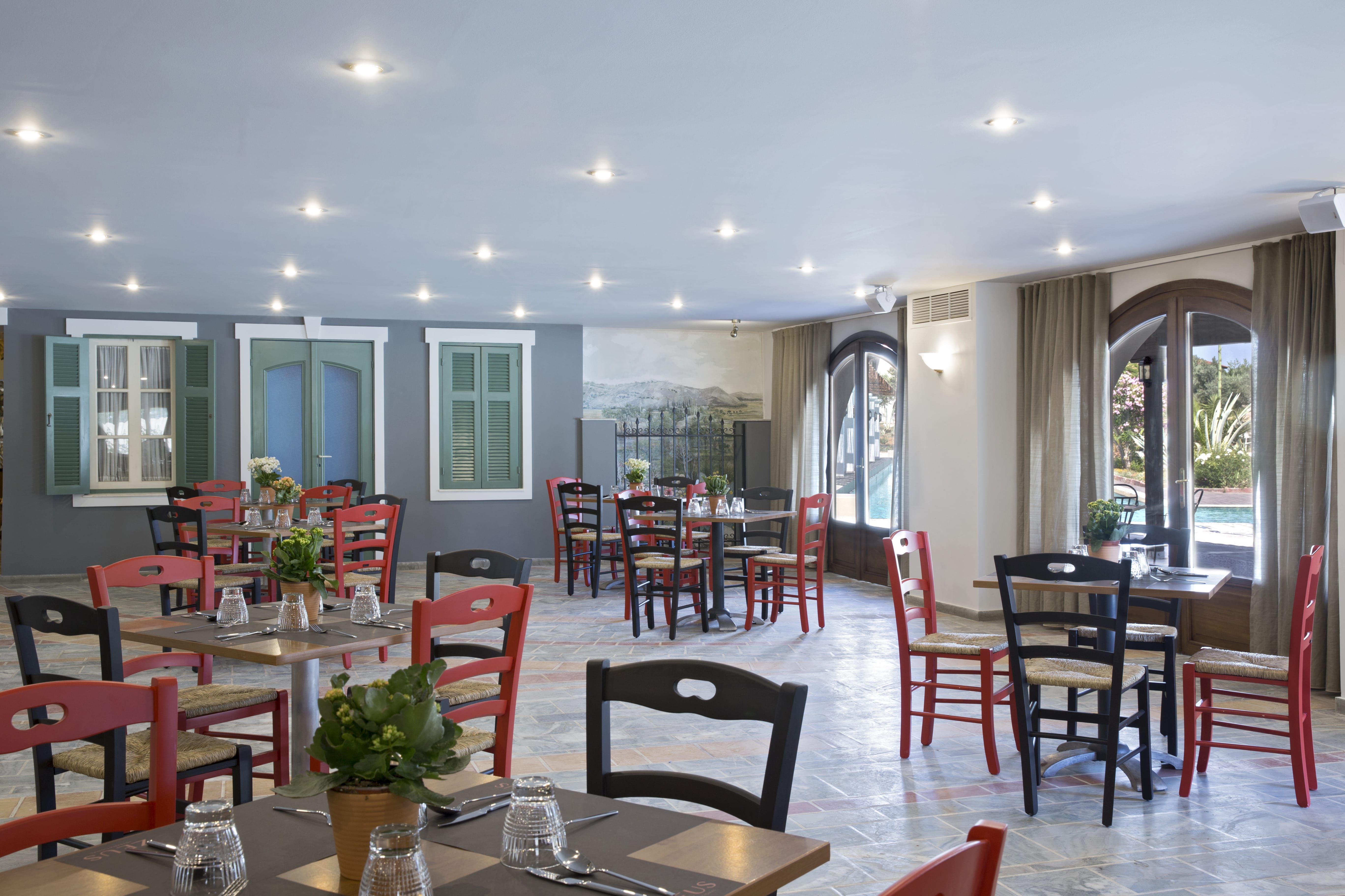 a room with tables and chairs