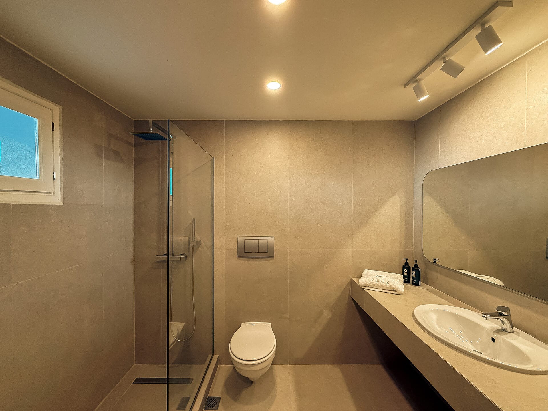 a bathroom with a glass shower