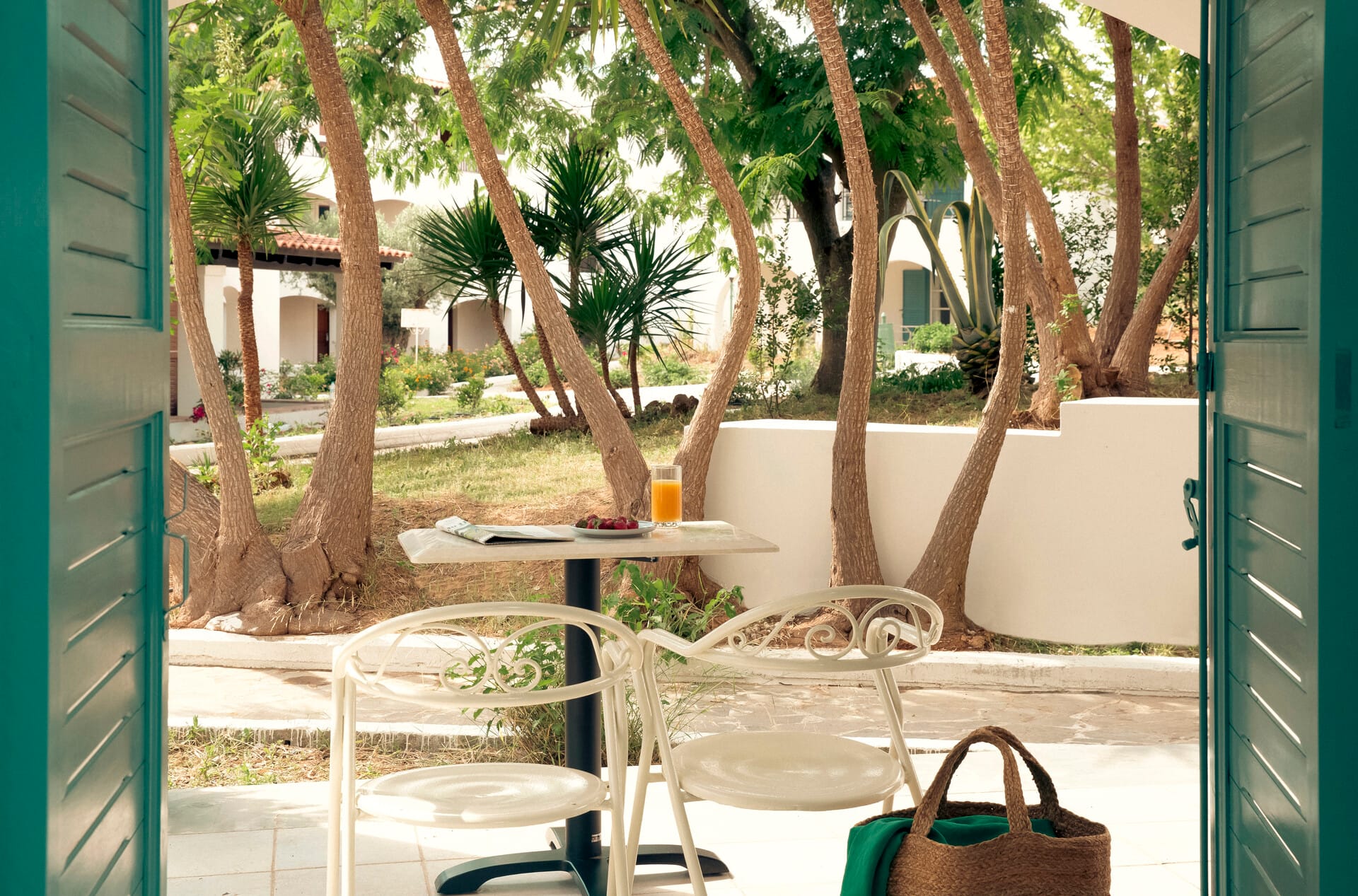 a patio with chairs and tables