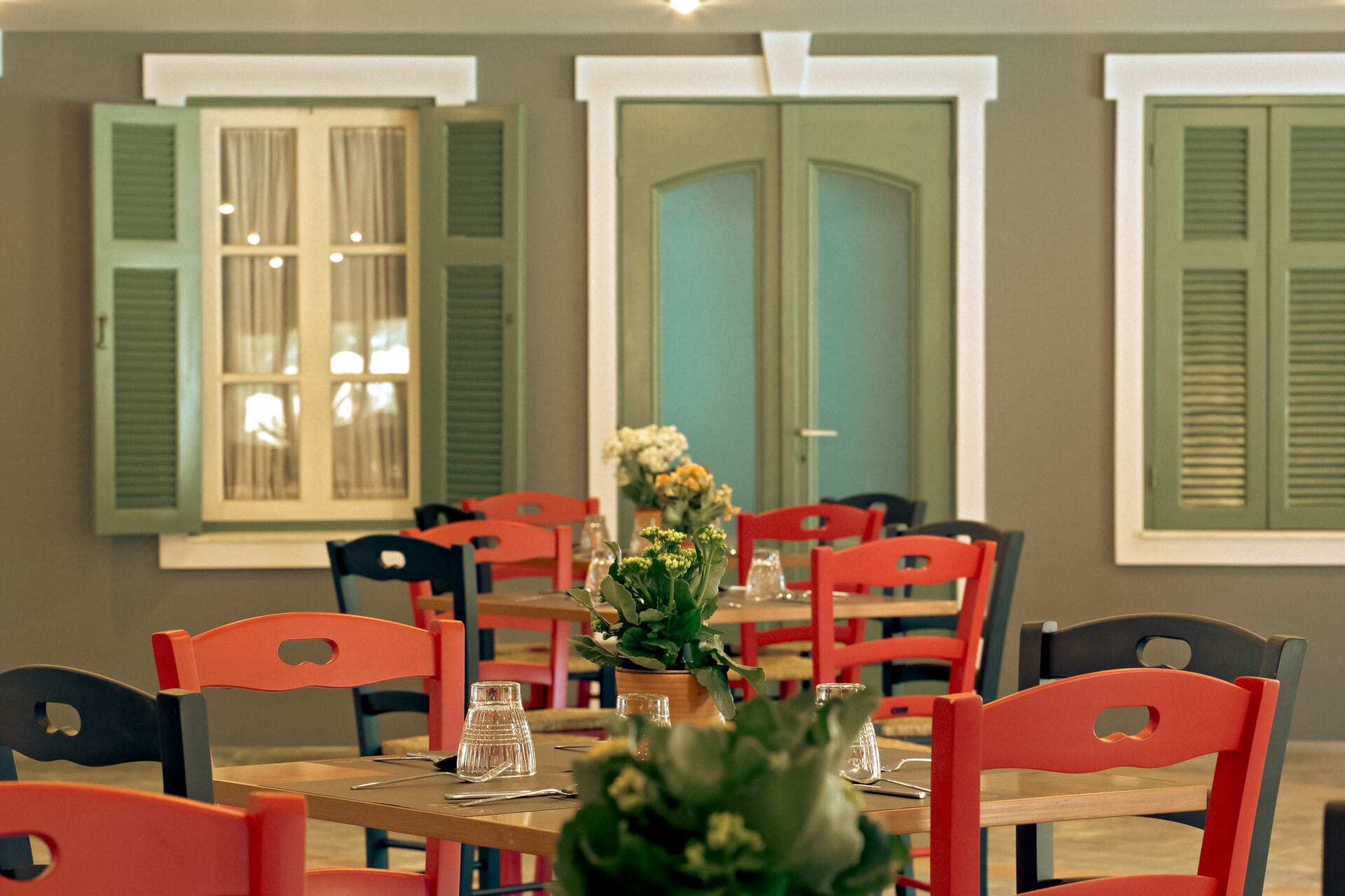 a room with tables and chairs