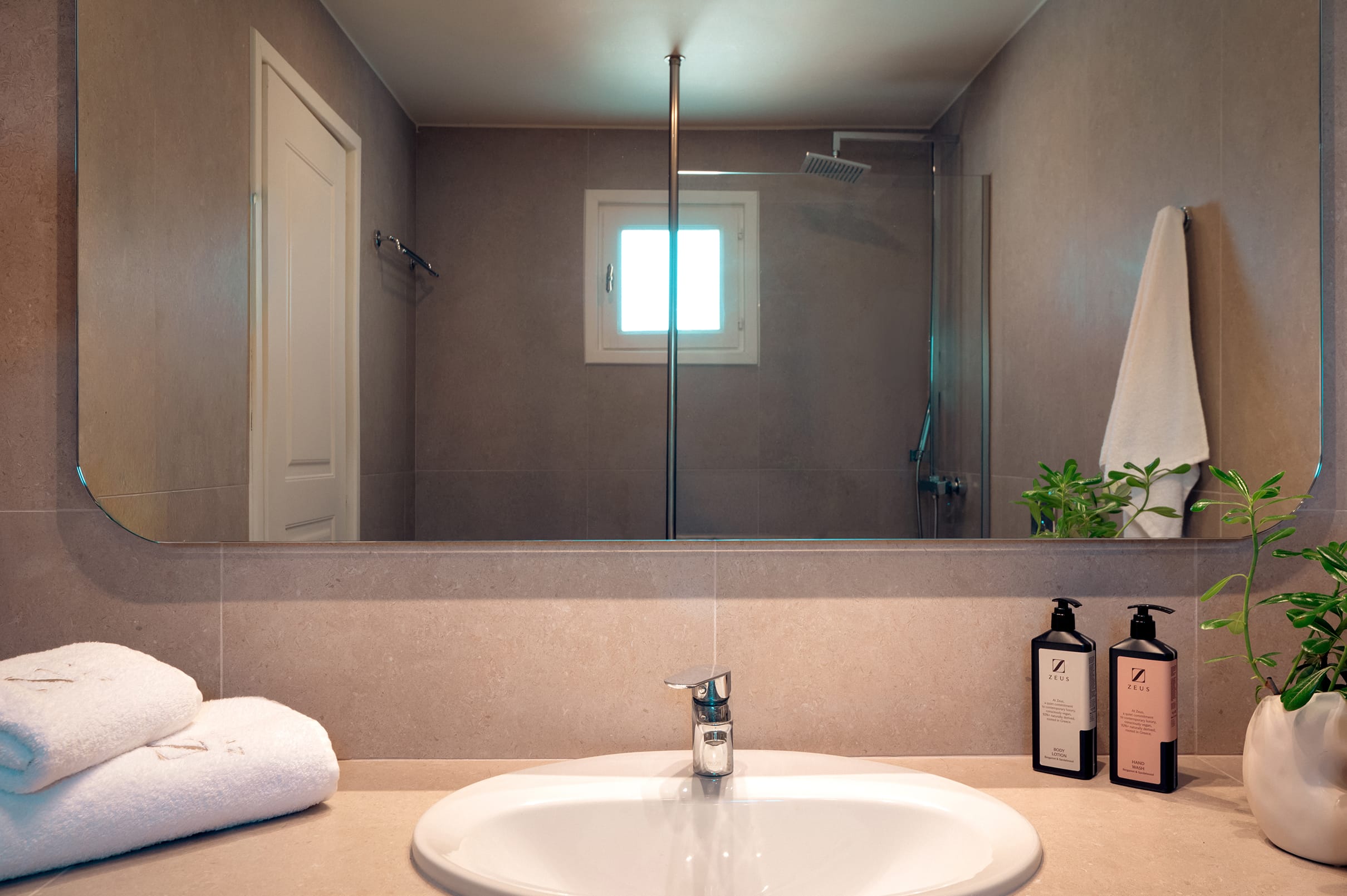 a bathroom with a large mirror