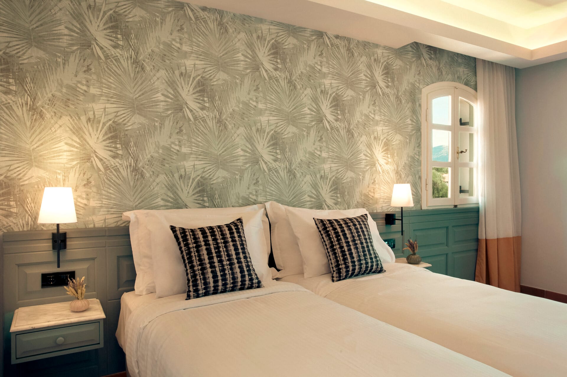 a bed with a white bed spread