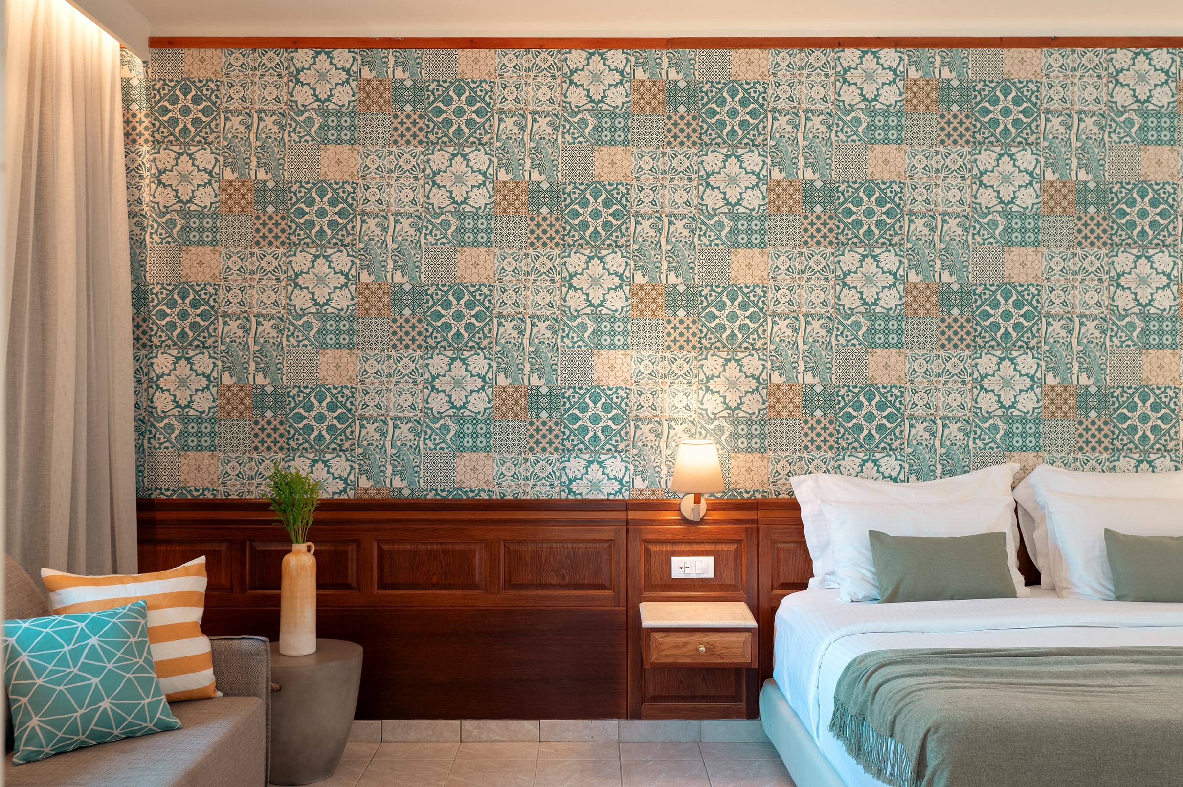 a room with a bed and a wallpaper