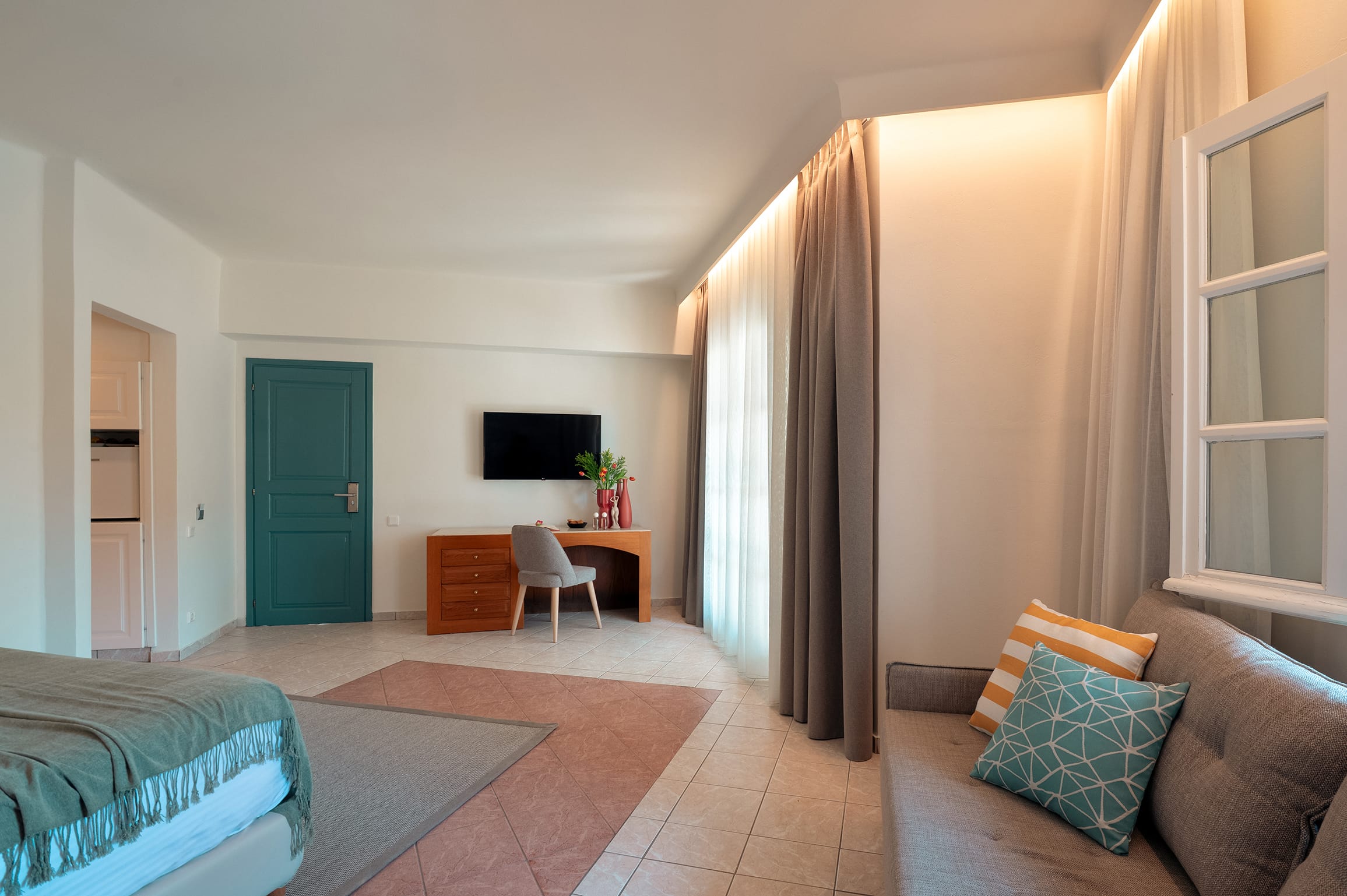 a room with a bed and a couch
