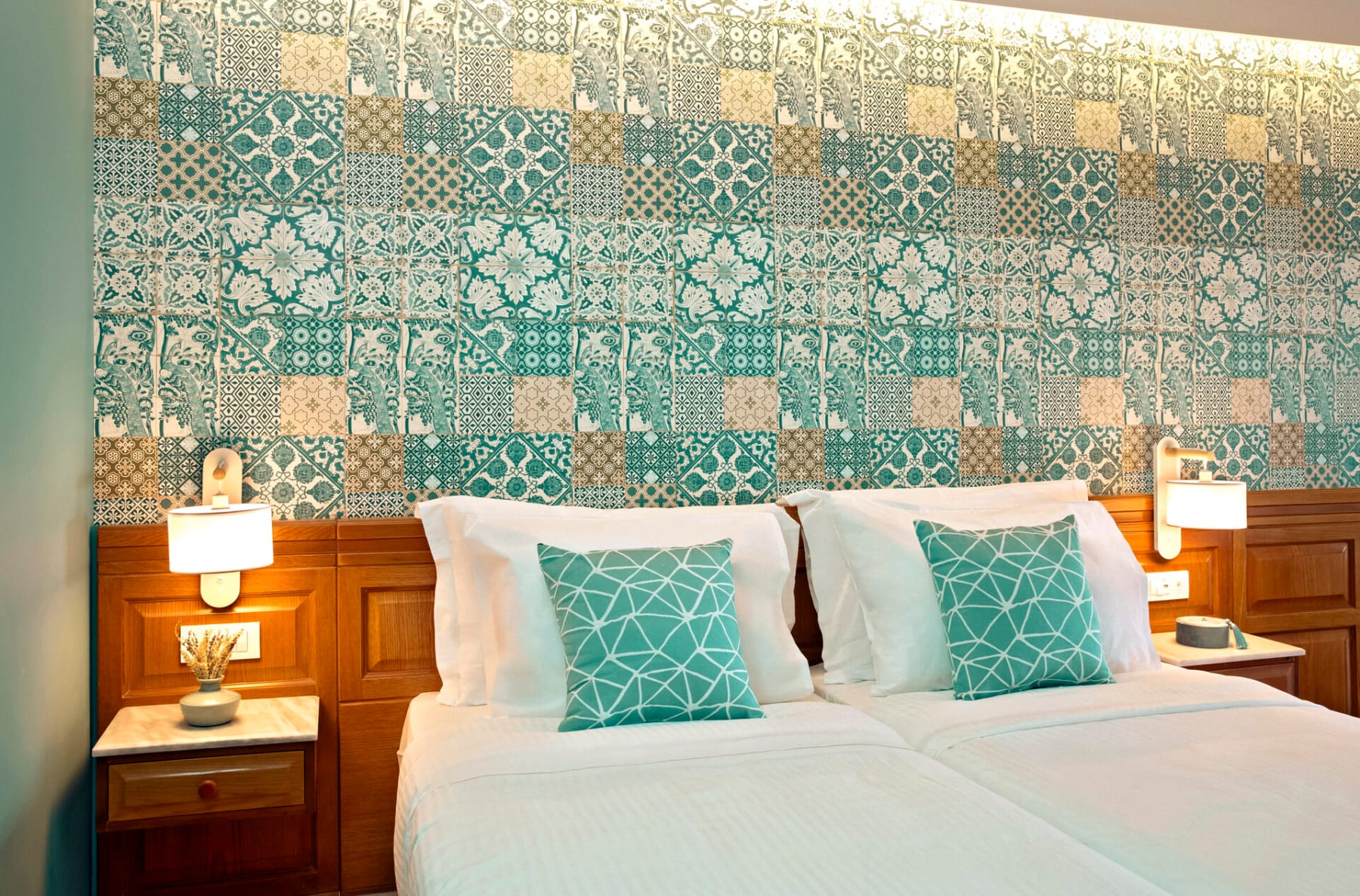 a bed with a wallpaper