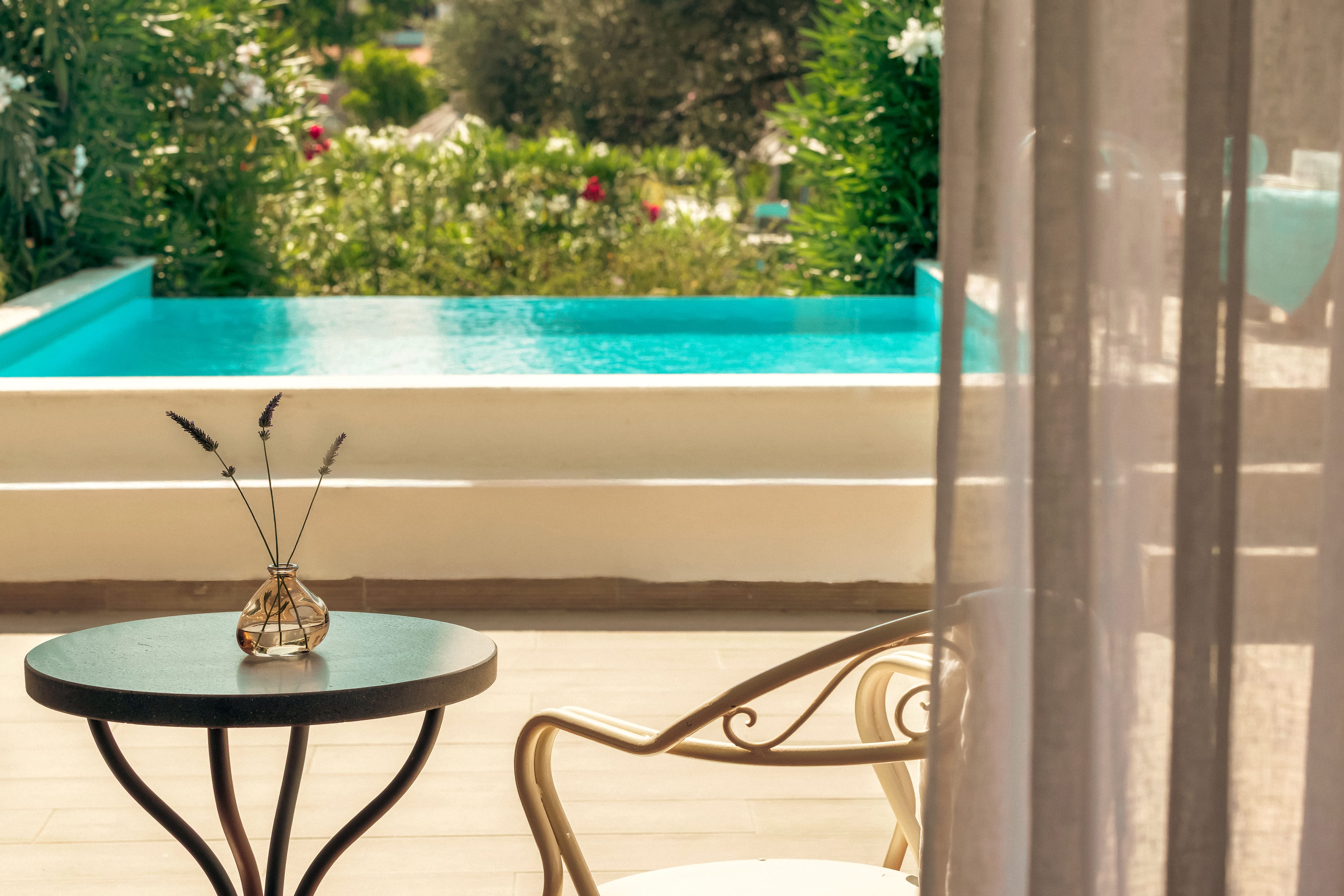 a table with a fountain in the background