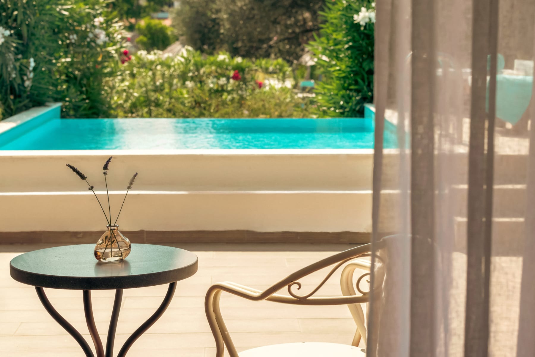 a table with a fountain in the background