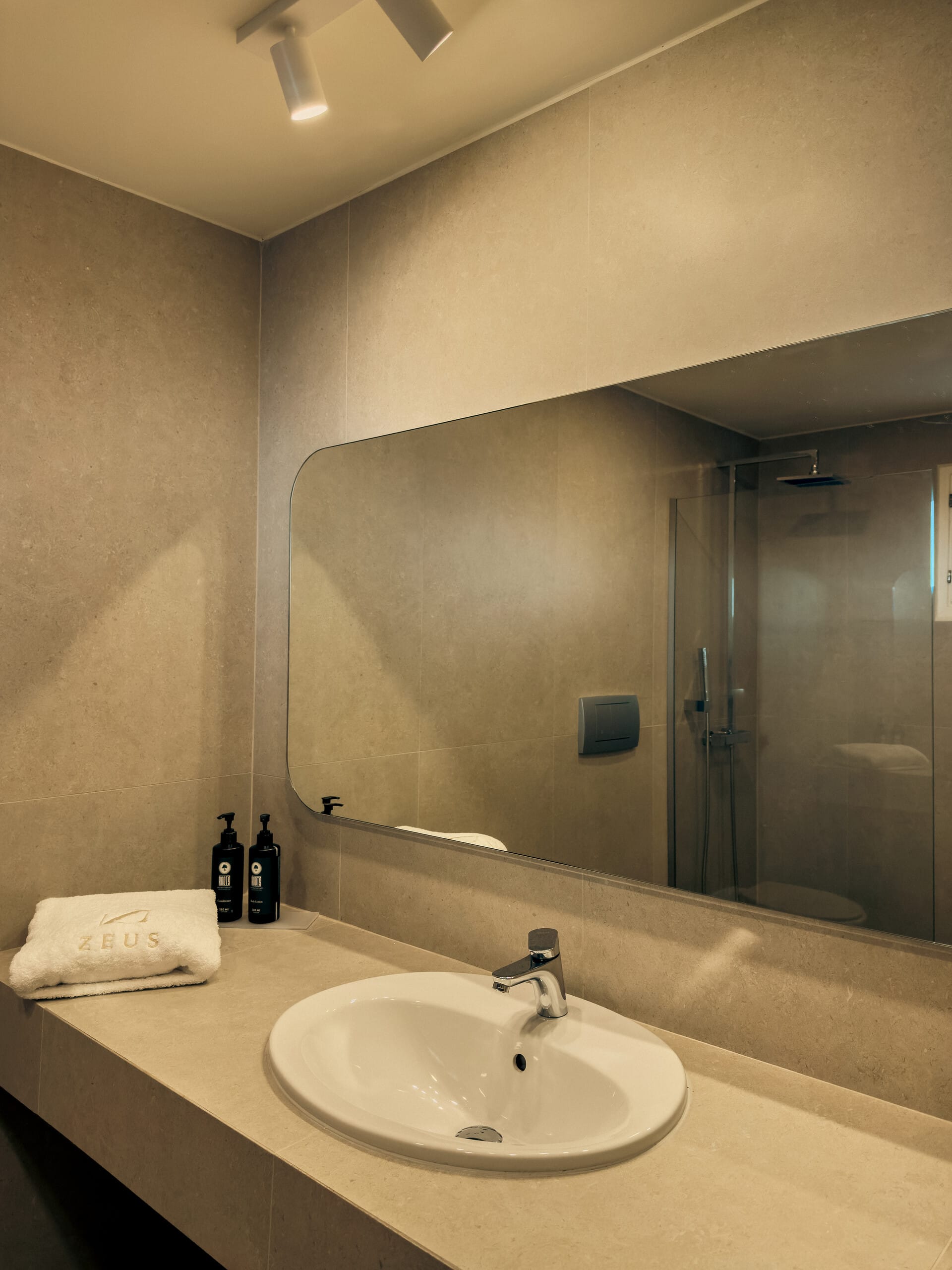 a bathroom with a large mirror