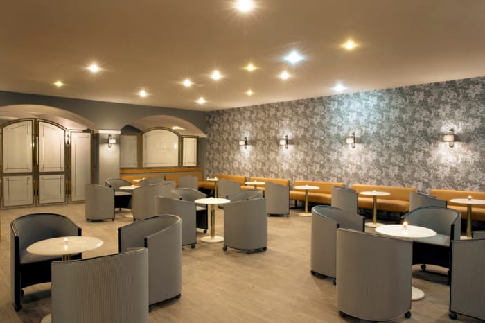 a room with tables and chairs