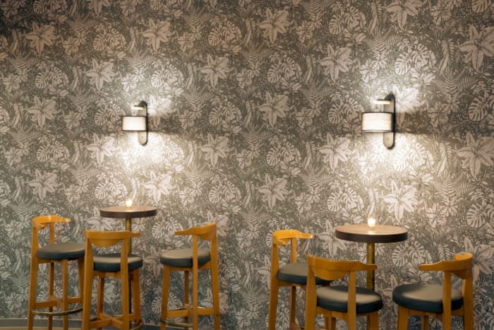 a room with tables and chairs