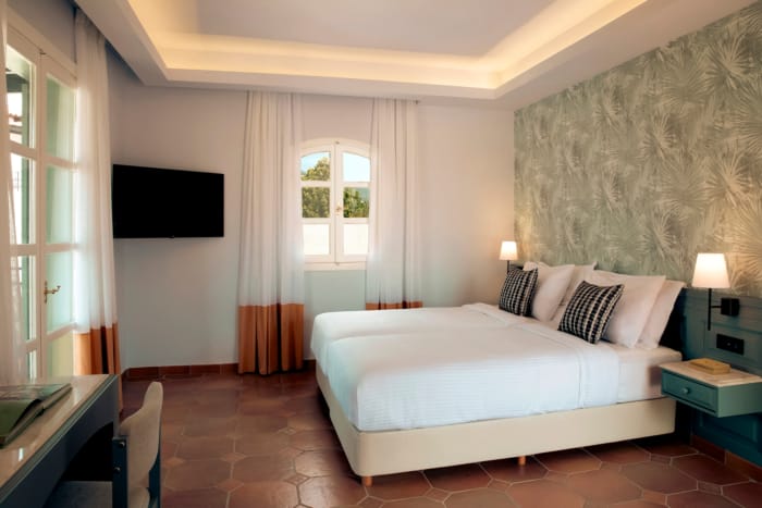 a bedroom with a large bed