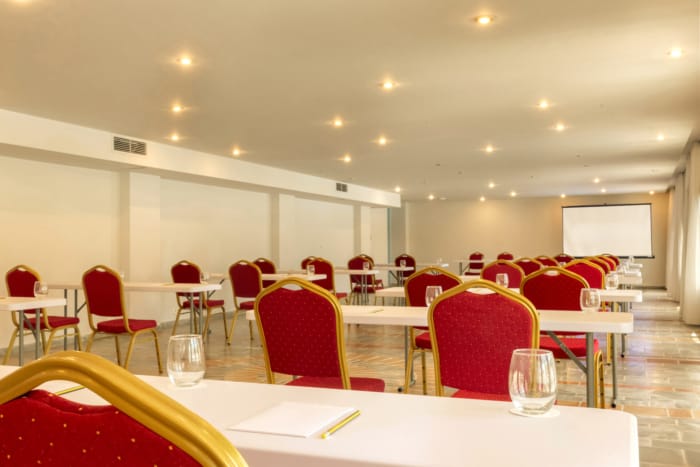 a room with tables and chairs
