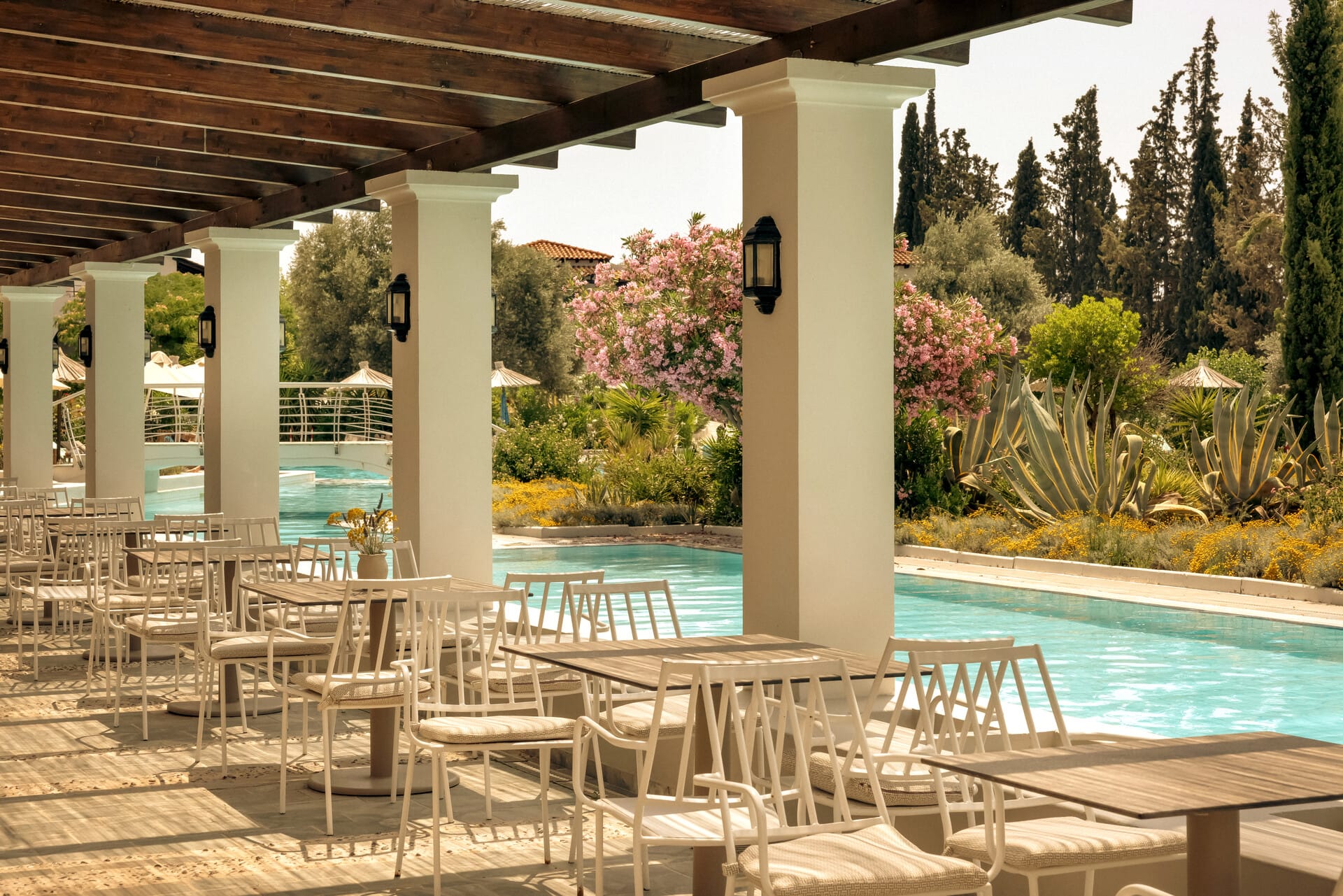 a pool with chairs around it