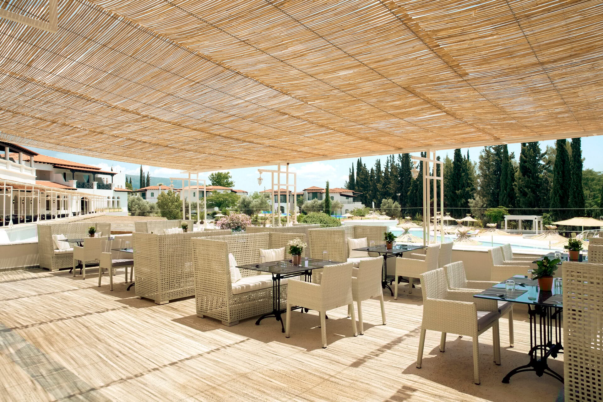 a large room with a wood floor and chairs