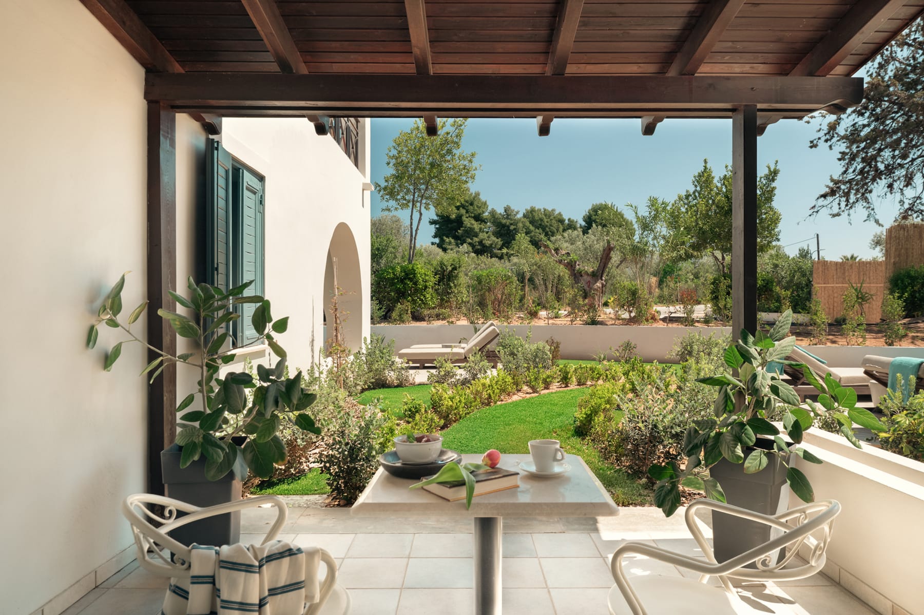 a patio with potted plants