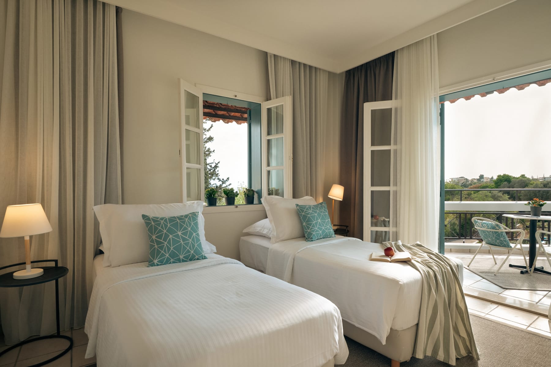 a bedroom with a large window