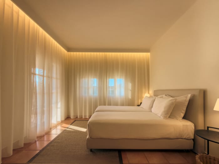 a room with a couch and a window