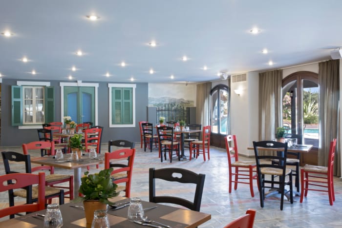 a room with tables and chairs
