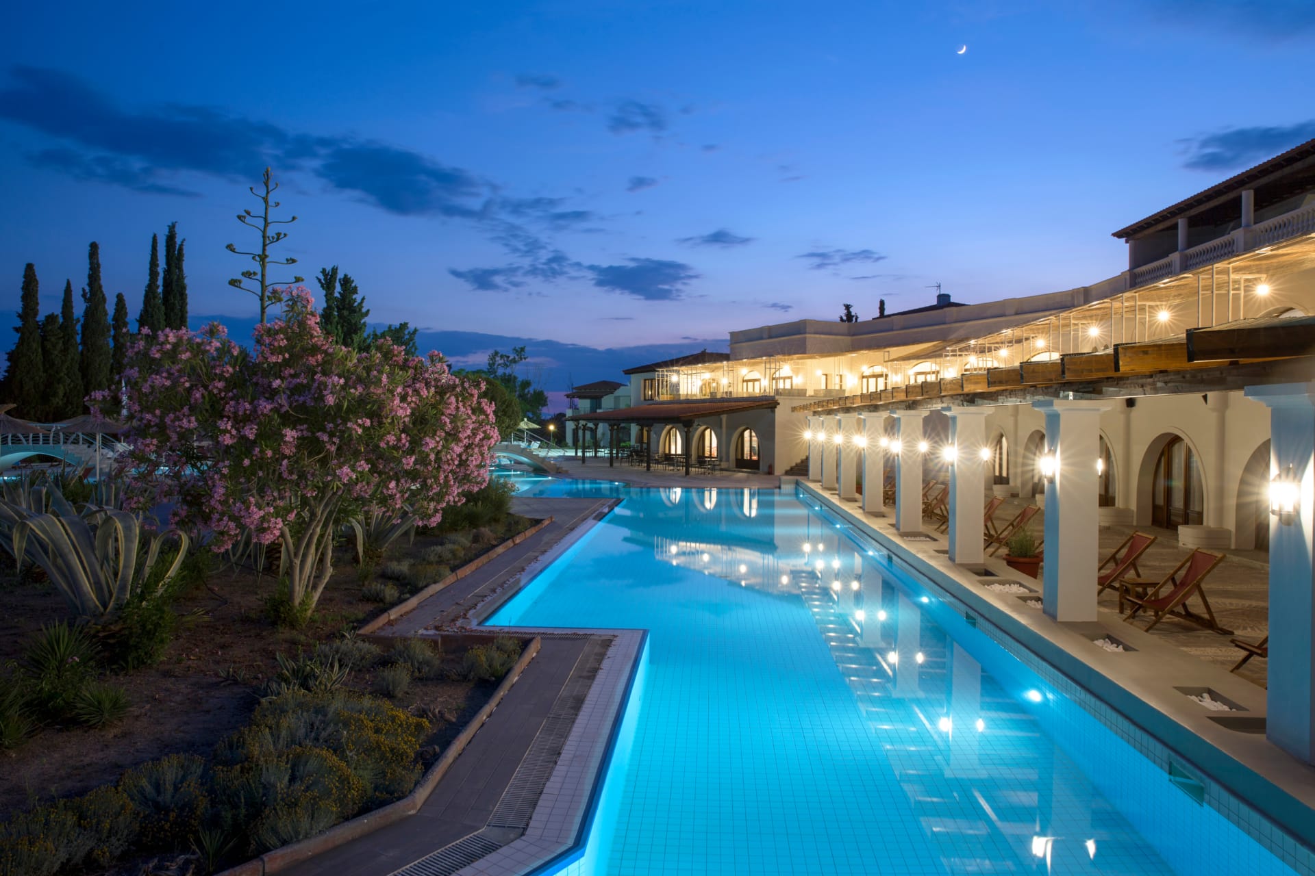 a pool with a building in the background