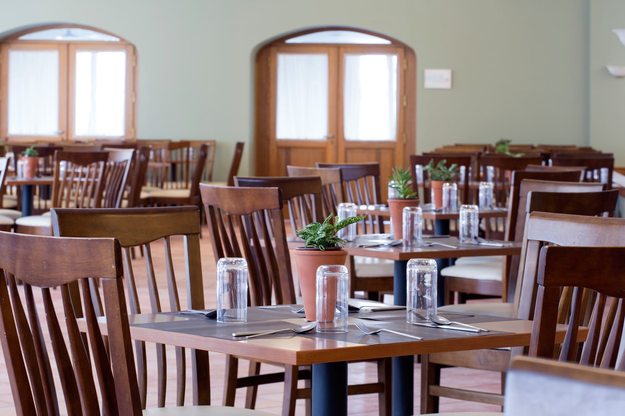a room with tables and chairs