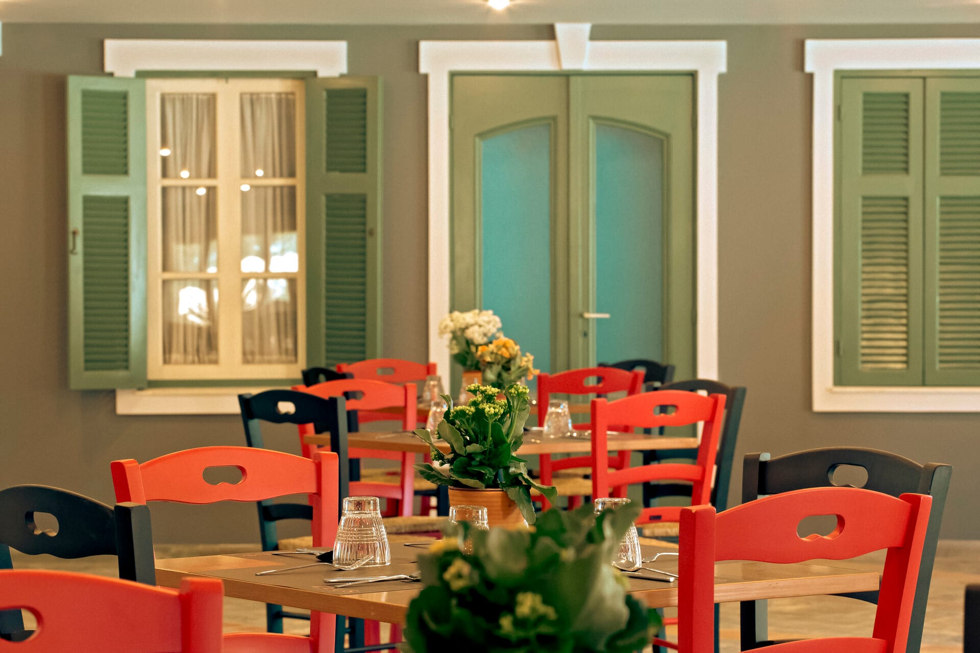 a room with tables and chairs