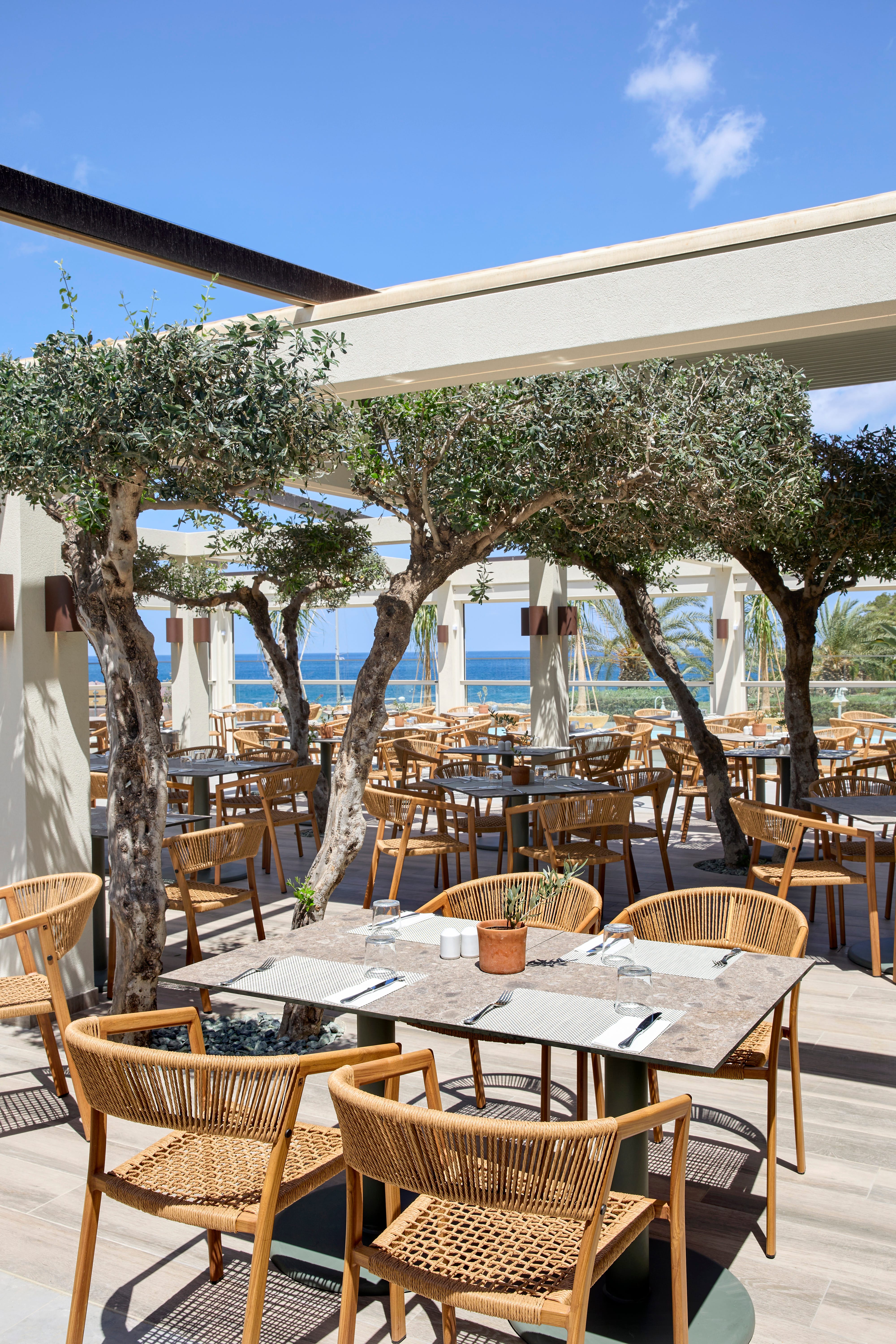 a group of tables and chairs outside