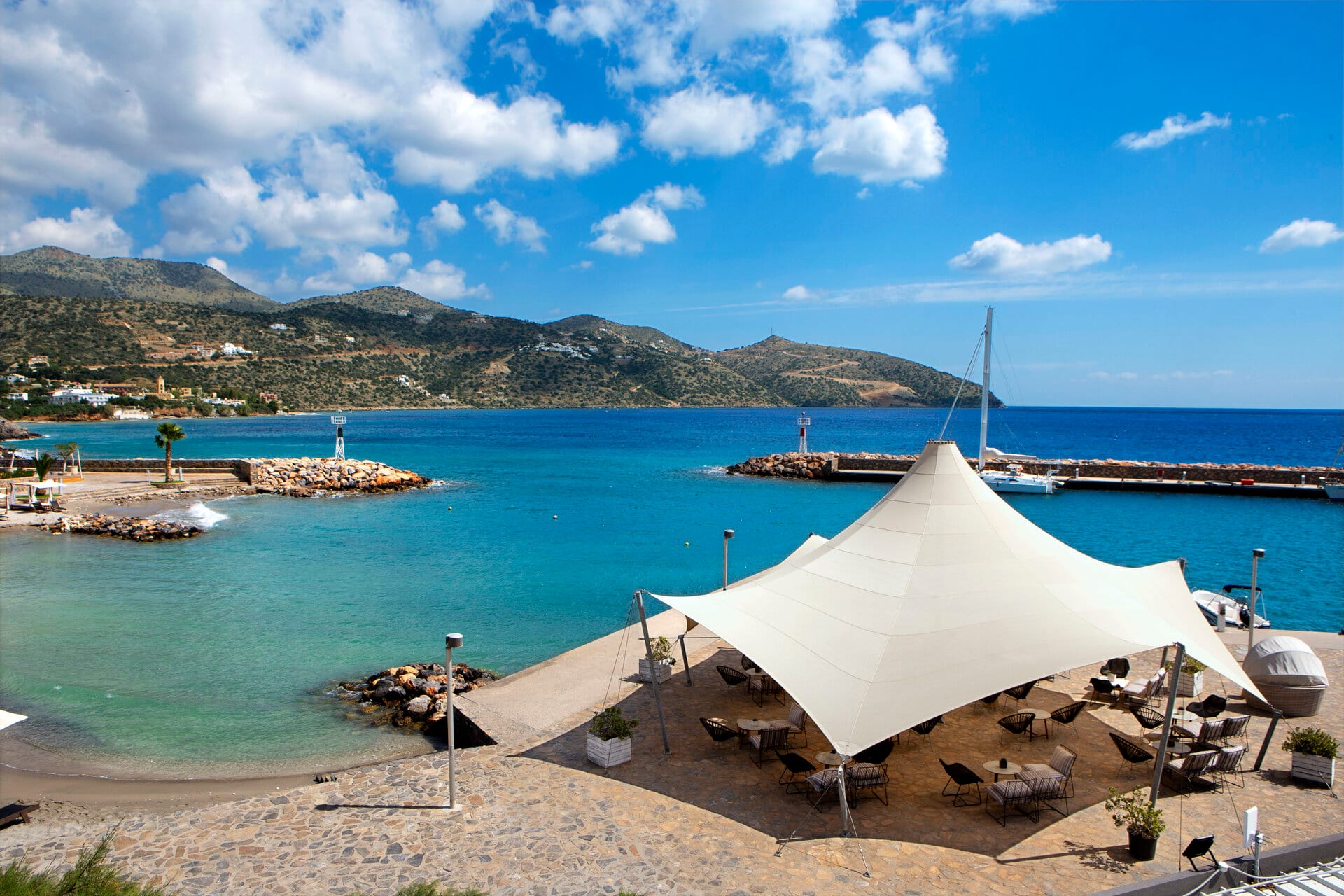 a white tent on a beach