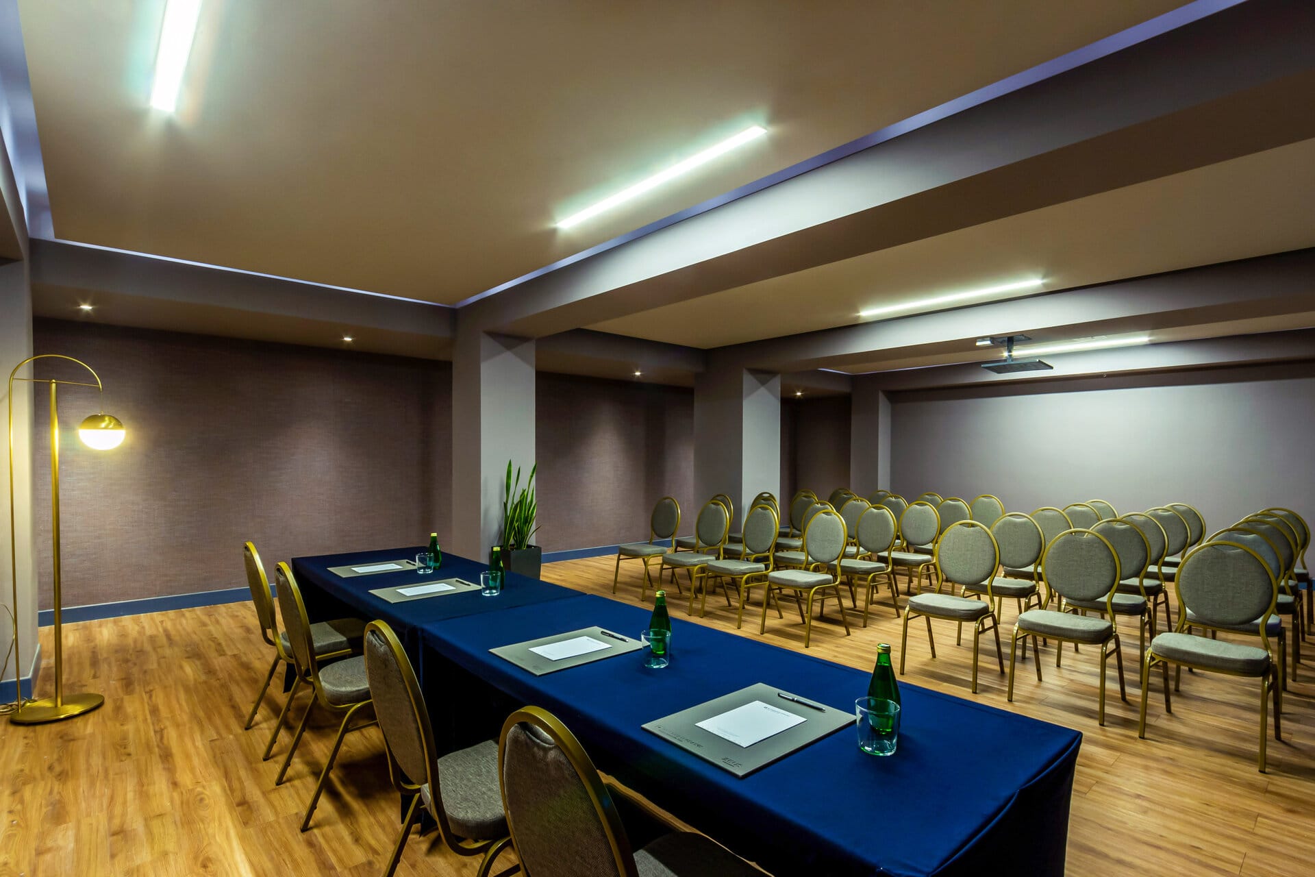 a room with a table and chairs