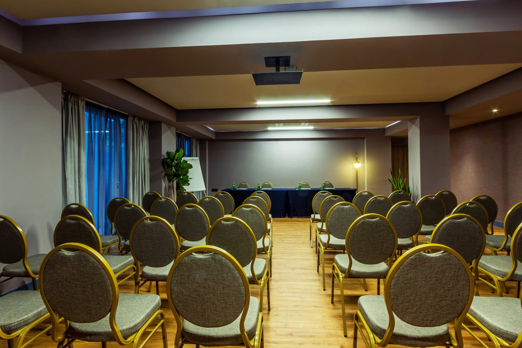 a room with rows of chairs