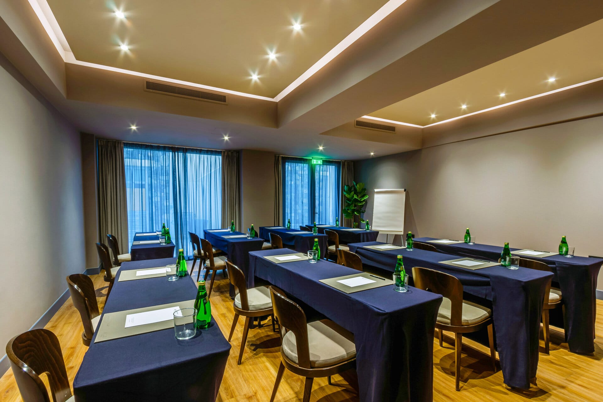 a room with tables and chairs