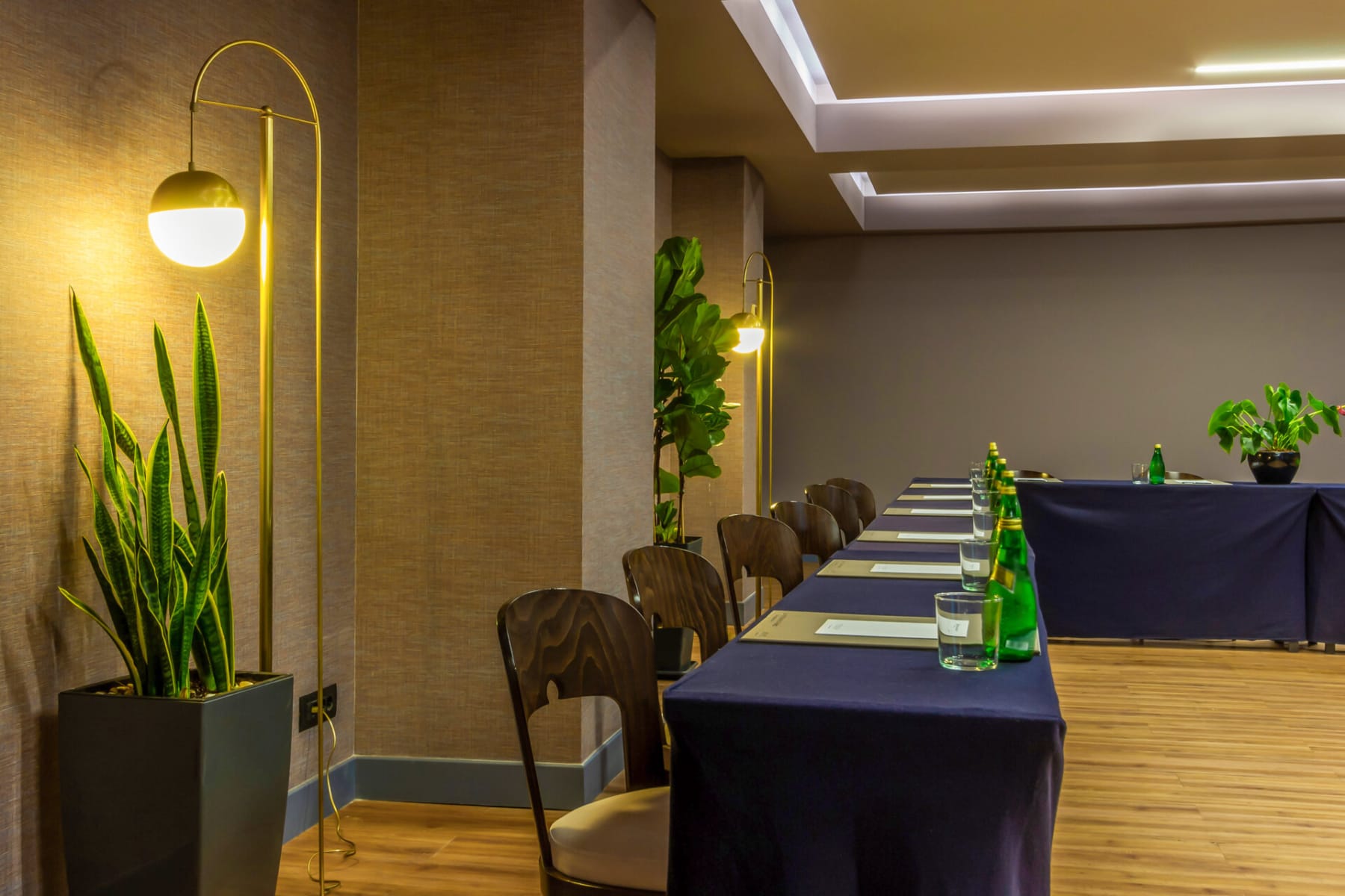 a room with tables and chairs