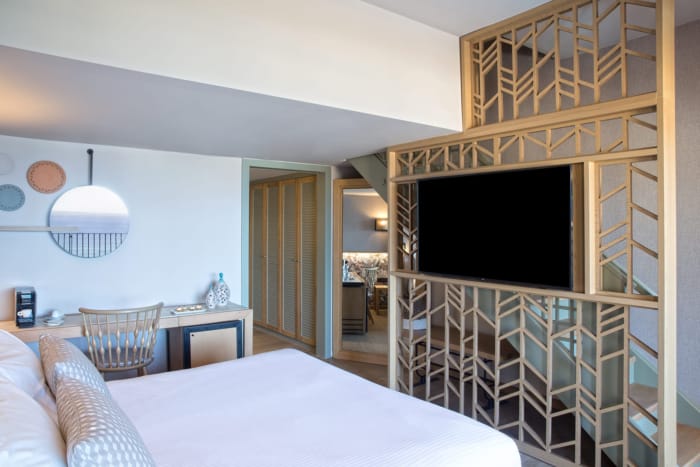 a bedroom with a bunk bed