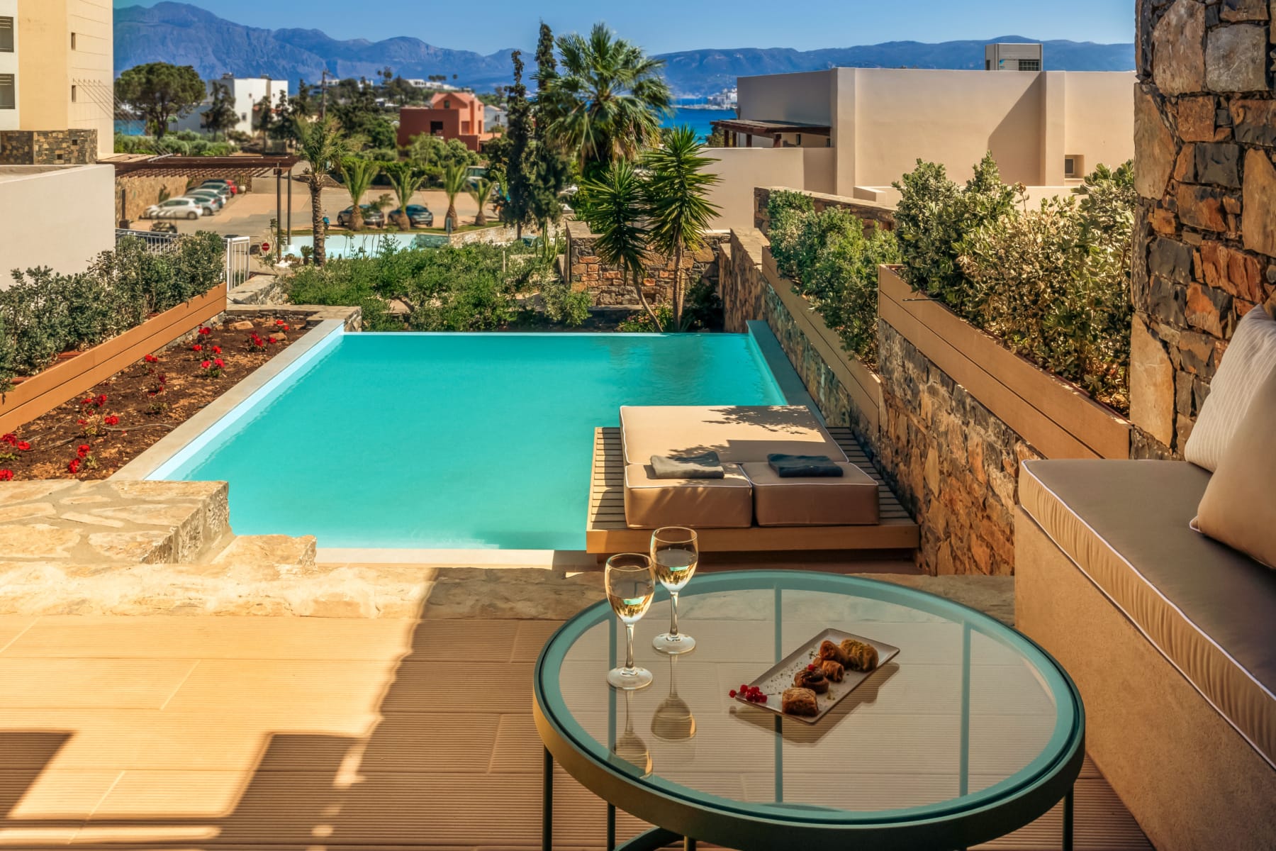 a pool with a table and food on it