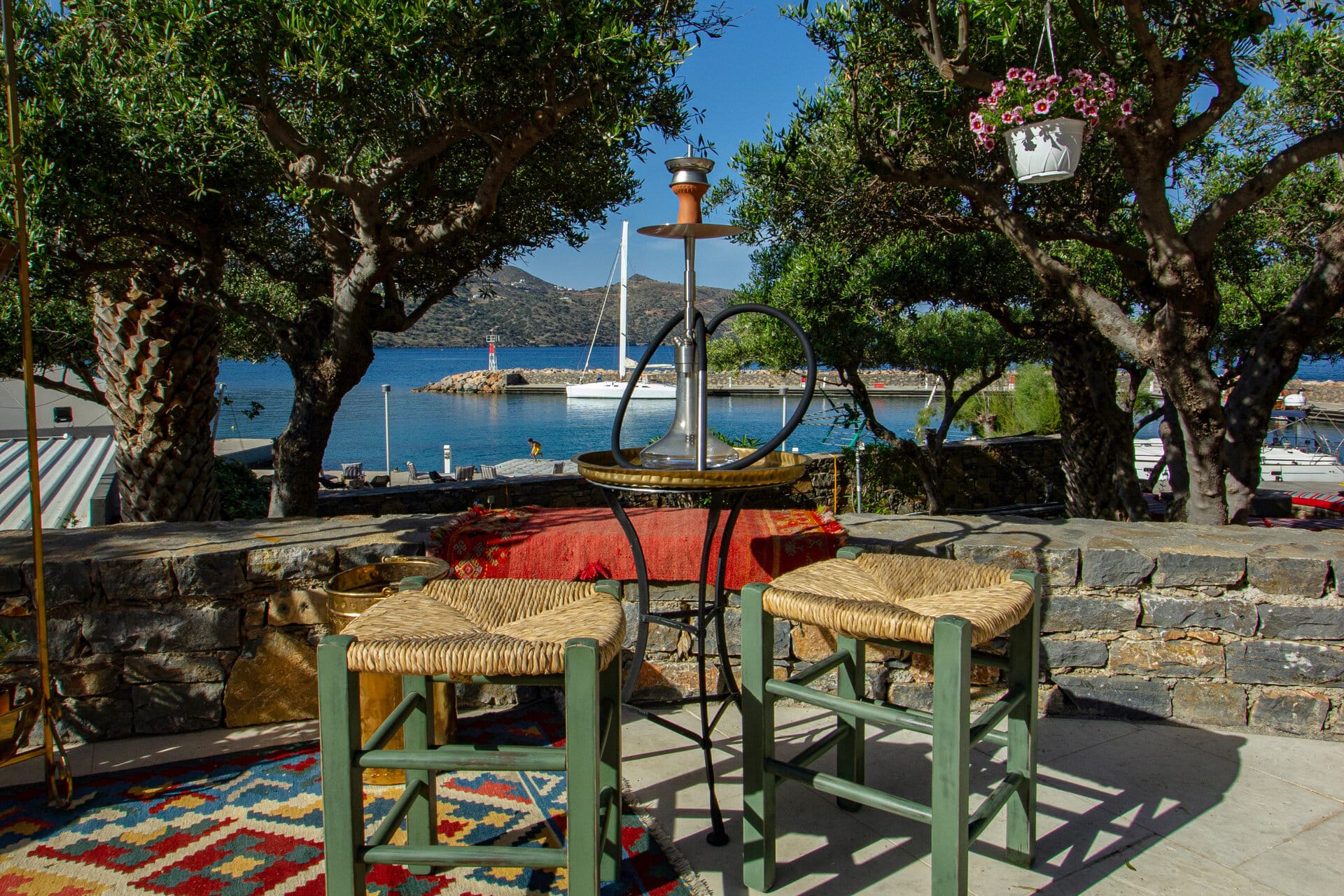 a patio with tables and chairs