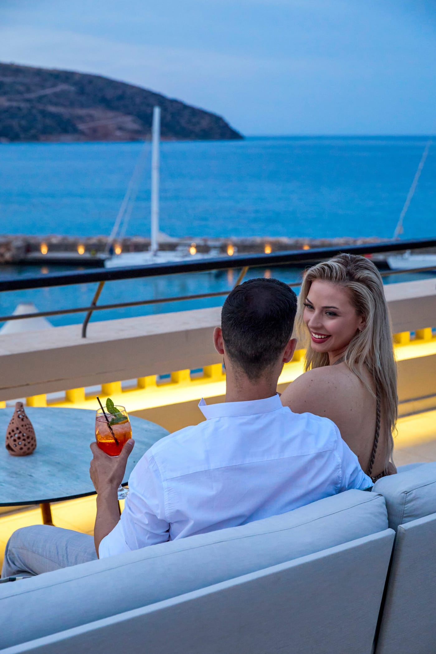 a man and woman on a boat